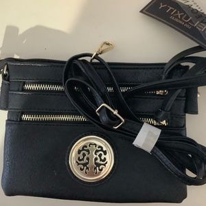 Purse. With shoulder strap, New with tag.  Send offers
